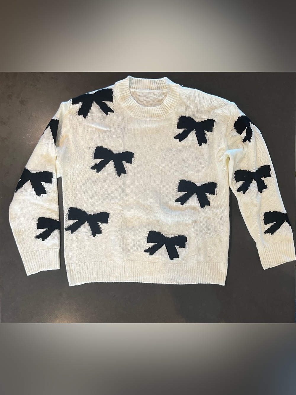 Women’s Cream Crewneck Sweater with Black Bow Motif